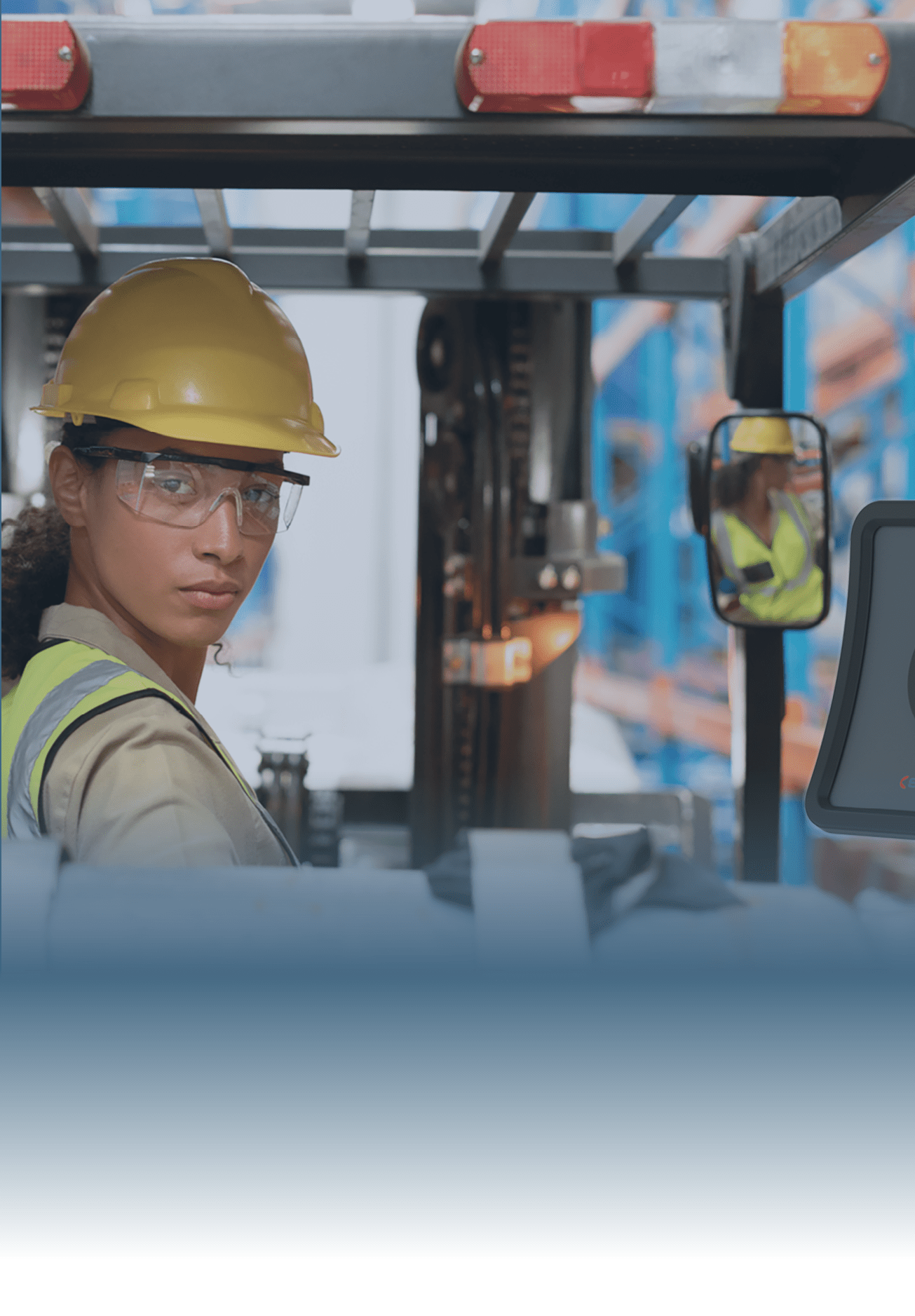 sexy mechanic standing in front of car engines